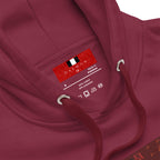 Maroon Supreme Models Picasso Stitches hoodie by Daemon Luxury, unisex cotton pullover with design details and a cozy hood.