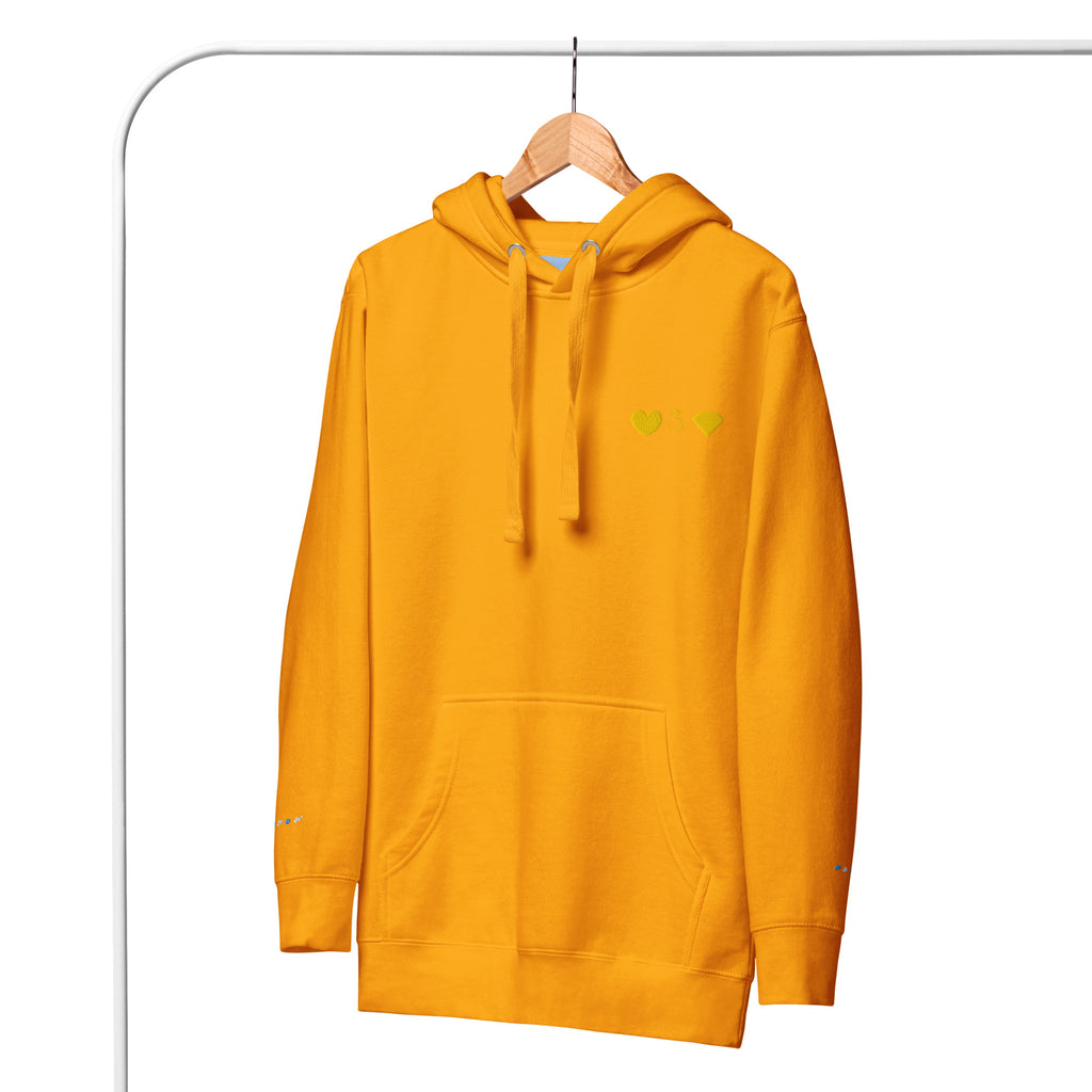 Unisex gold hoodie by Daemon featuring a cotton-heritage fabric, front design, and a comfortable pullover style with a hood.