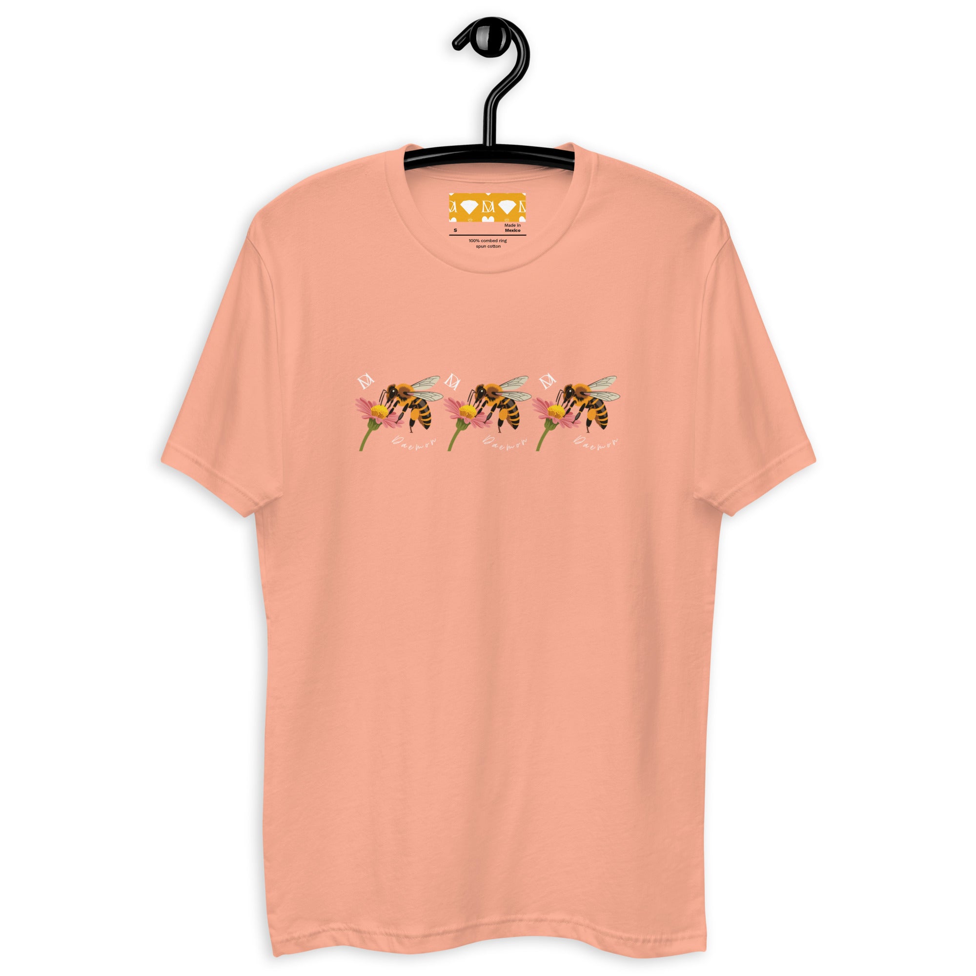 Men's fitted T-shirt in desert pink featuring Honeybee California Sunset Seed design by Daemon Luxury, front view.