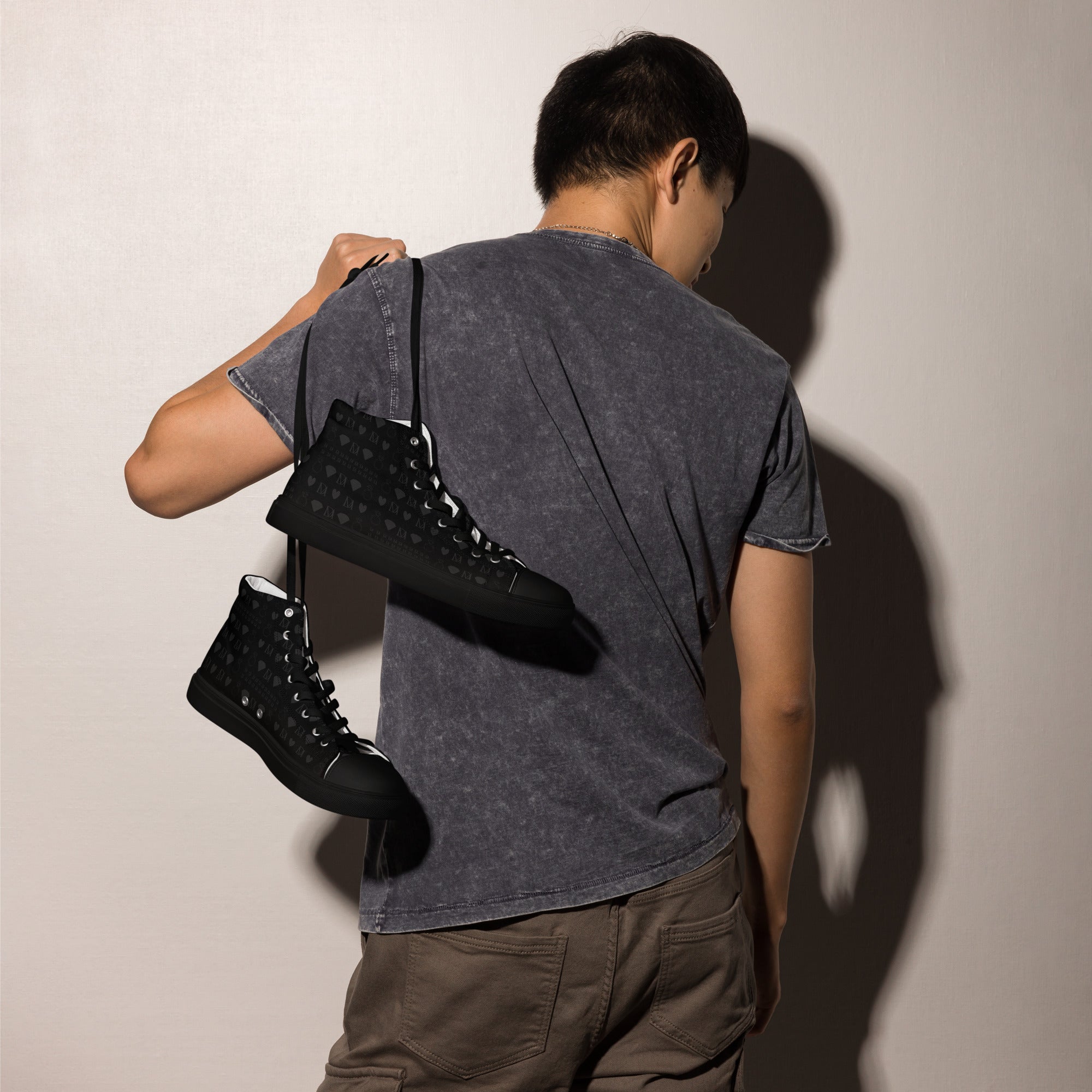 Black men's high-top canvas shoes by Daemon Luxury featuring frosted diamond accents and platinum detailing.