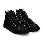 Black men's high-top canvas shoes with speckled diamond pattern from Daemon Luxury's NEMESIS Male collection, right front view.