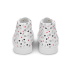 White high-top canvas shoes by Daemon Luxury with speckled diamond pattern on the back, designed for stylish men's footwear.