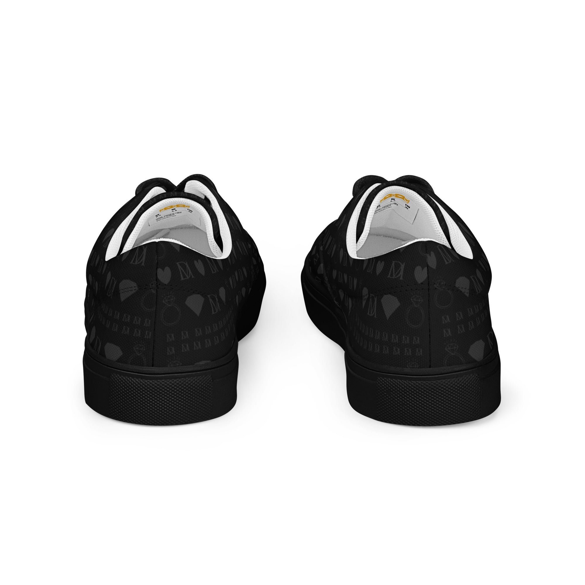 Black men's lace-up canvas shoes with frosted diamond accents and platinum detailing from Daemon Luxury.