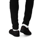 Black men's lace-up canvas shoes with speckled diamond pattern by Daemon Luxury, featuring a sleek back design.