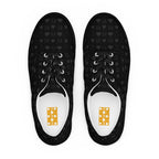 Black men's lace-up canvas shoes featuring frosted diamond accents by Daemon Luxury, front view showcasing stylish design.