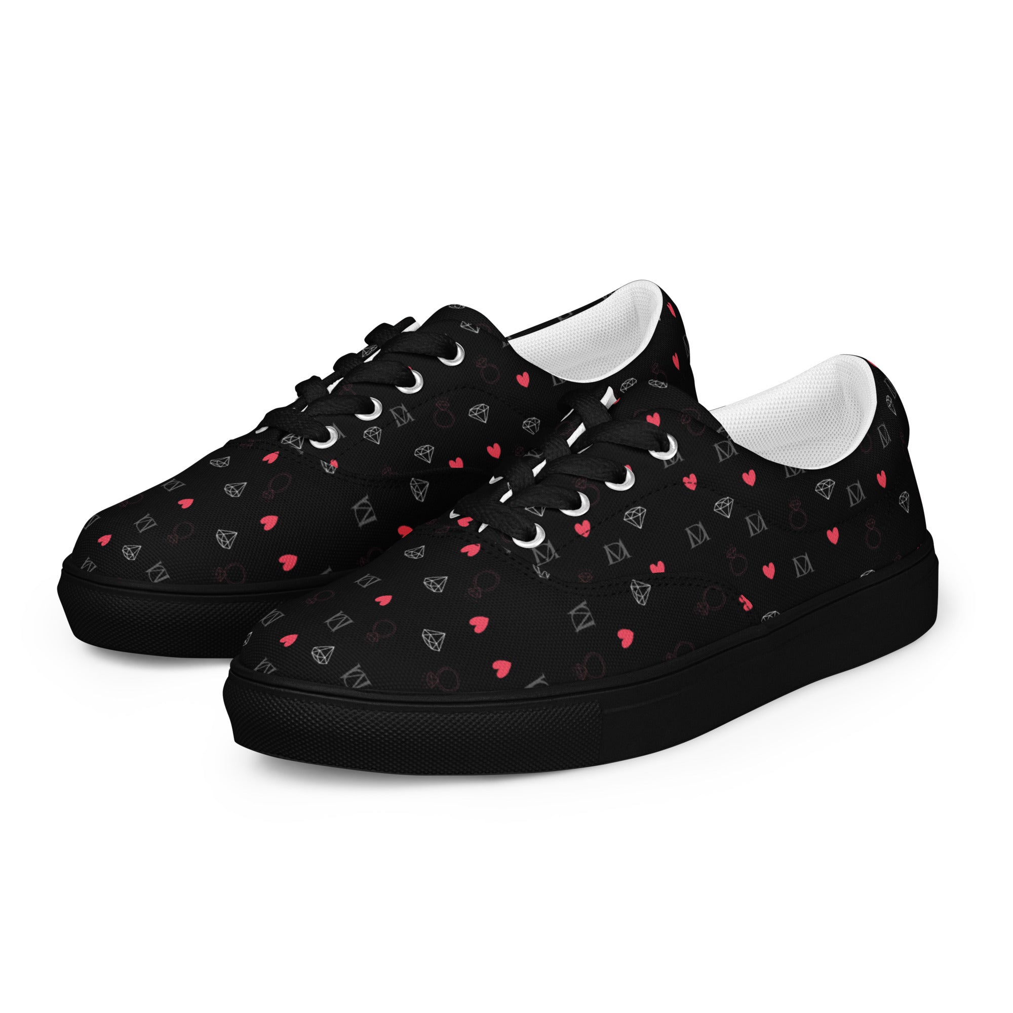 Black men's lace-up canvas shoes featuring speckled diamond pattern by Daemon Luxury, shown from front and left side.