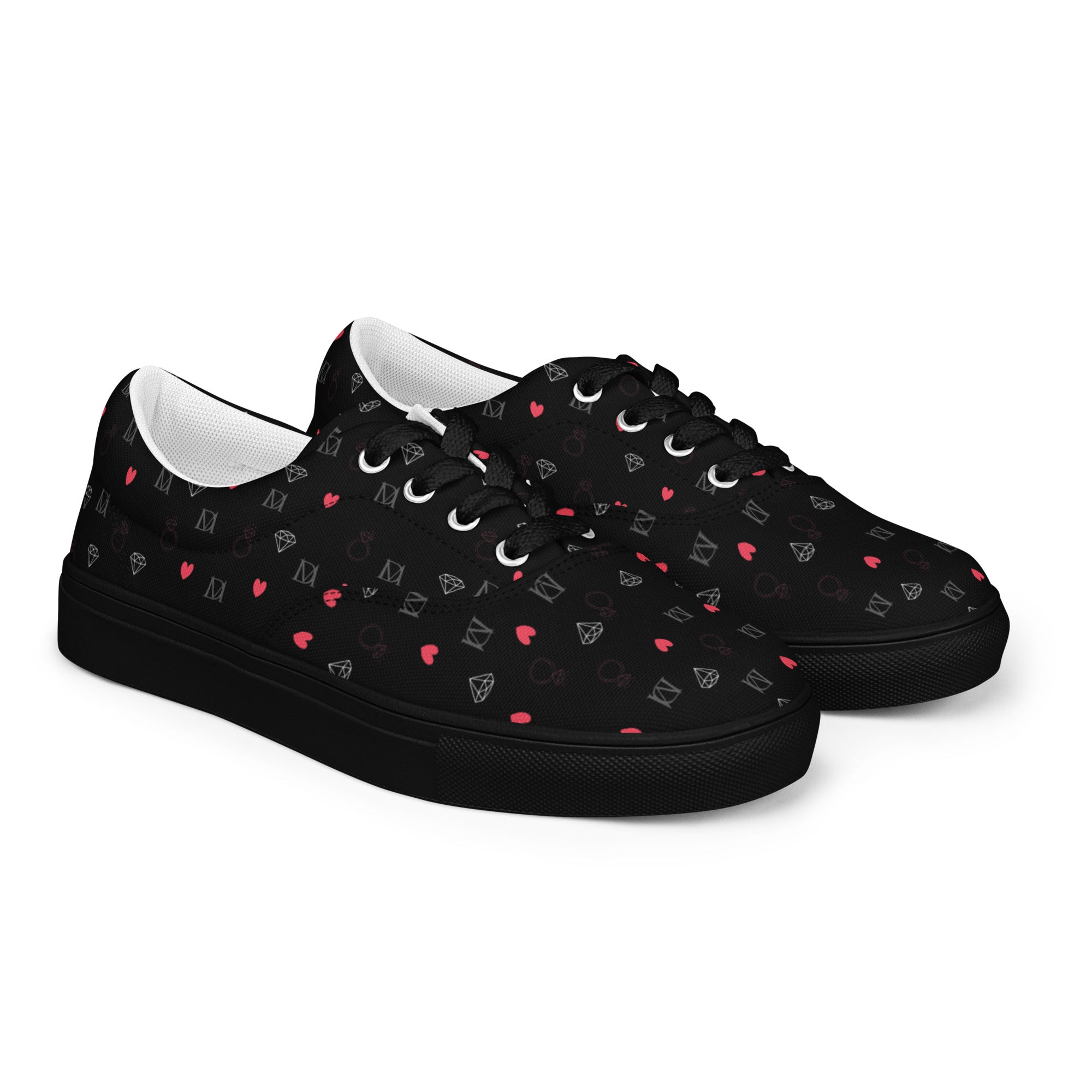 Black men's lace-up canvas shoes with speckled diamond pattern, designed by Daemon Luxury, shown from front right angle.