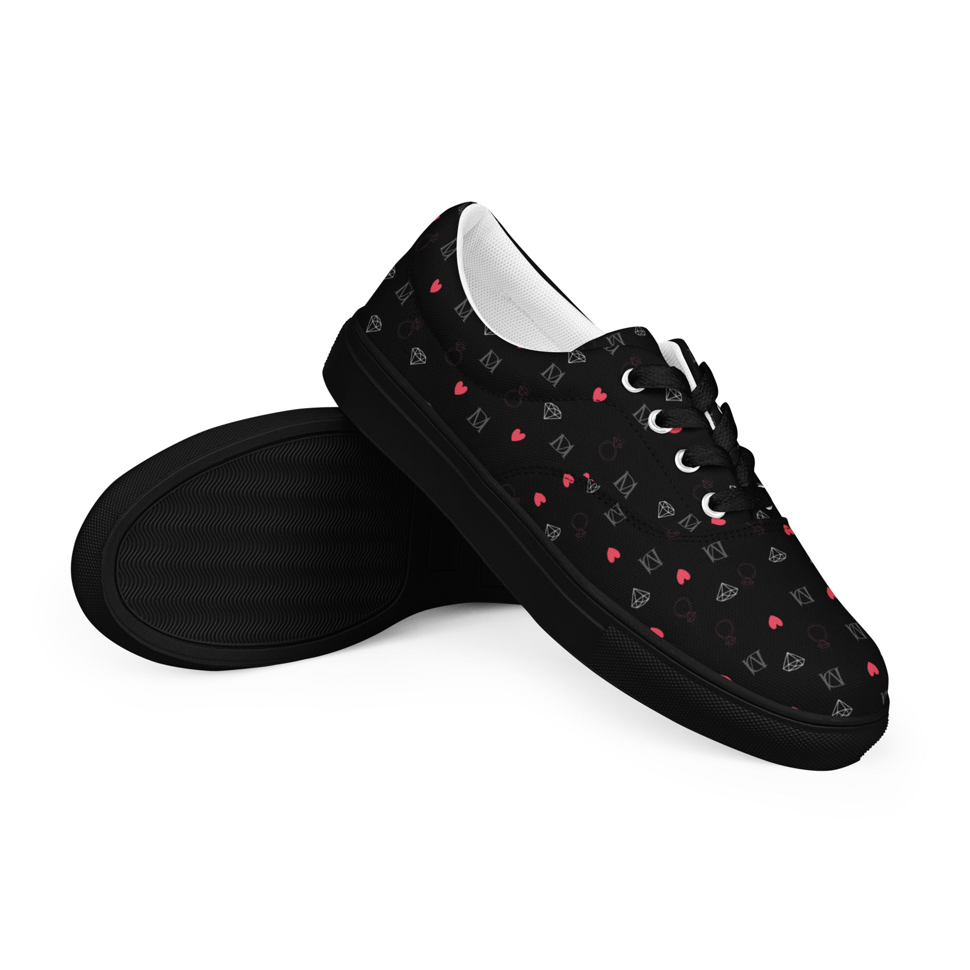 Black men's lace-up canvas shoes with speckled diamond design by Daemon Luxury, shown from right front angle.