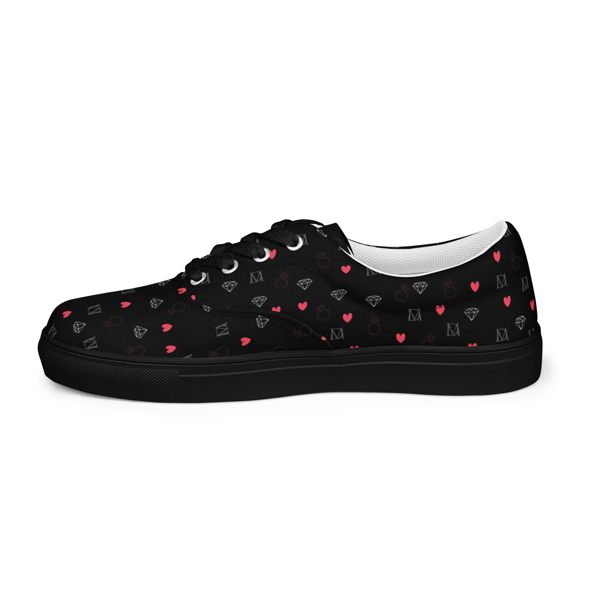Black men's lace-up canvas shoes by Daemon Luxury featuring speckled diamond pattern, right inside view.