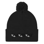 Black pom-pom-knit cap from Daemon Luxury's Night Captain single vision collection, stylish winter hat with a cozy design.