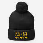 Daemon Luxury Nemesis Sun Glow black pom-pom knit cap front view, cozy wool berretto lana with stylish design