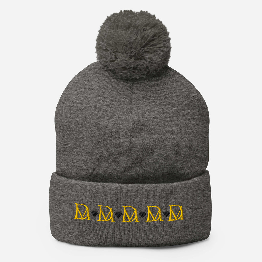 Daemon Luxury Stormless Dim Sun Glow pom-pom-knit wool cap in dark heather grey, showcasing front view and cozy knit texture.