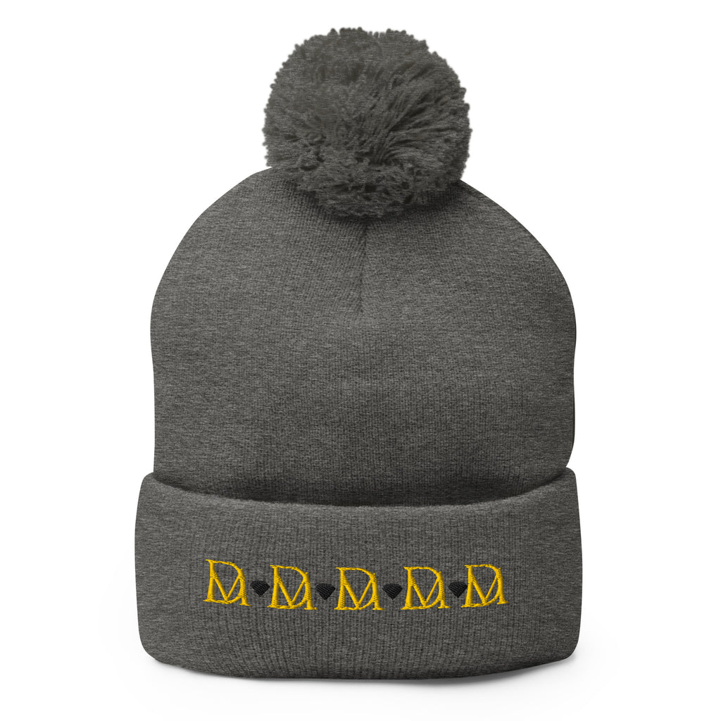 Daemon Luxury Stormless Dim Sun Glow pom-pom-knit wool cap in dark heather grey, front view showcasing cozy winter style.