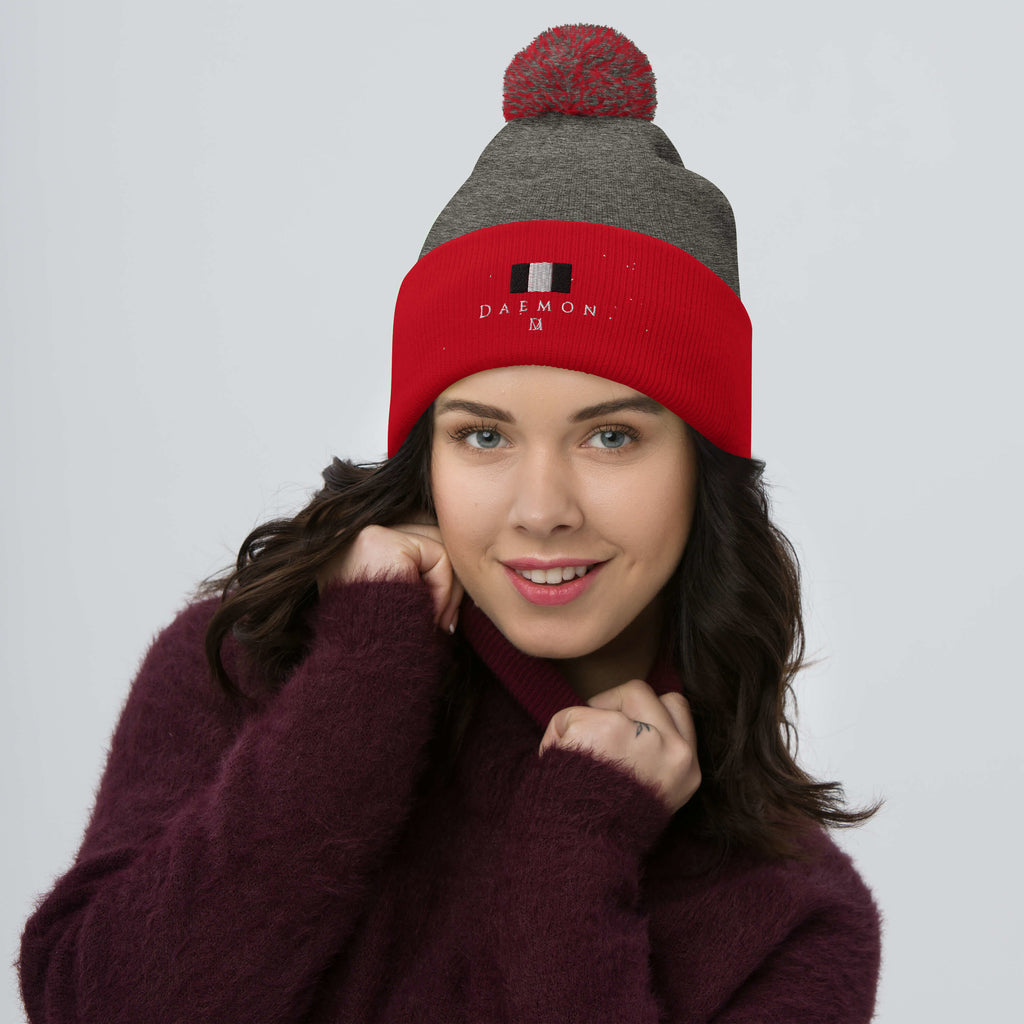 Dark heather grey and red knit pom-pom winter cap from Daemon Luxury, Lux Class Snow Light collection, cozy wool beanie with a pom-pom.