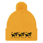 Daemon Luxury Honeybee California pom-pom knit cap in gold, showcasing a stylish front view with cozy, textured knit fabric.