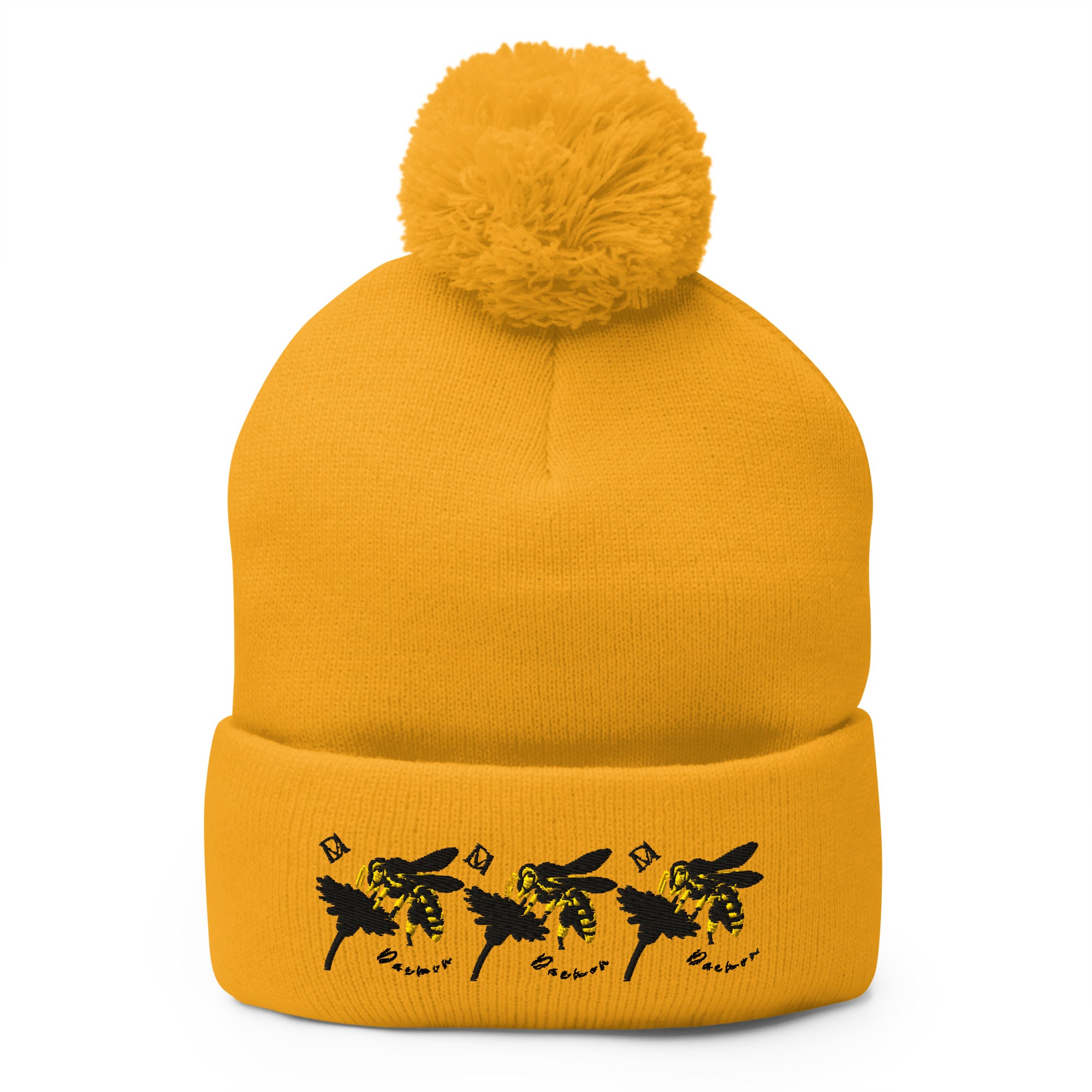 Golden honeybee Pom-Pom Knit Cap by Daemon Luxury with a front view and plush pom-pom detail.