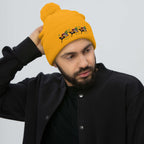 Daemon Luxury Honeybee California Gold Tender pom-pom knit lana cap, front view with cozy texture and stylish design.