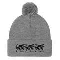 Daemon Luxury Stormless Berretto Lana knitted pom-pom hat in heather grey, front view showing cozy wool knit and playful pom-pom detail.
