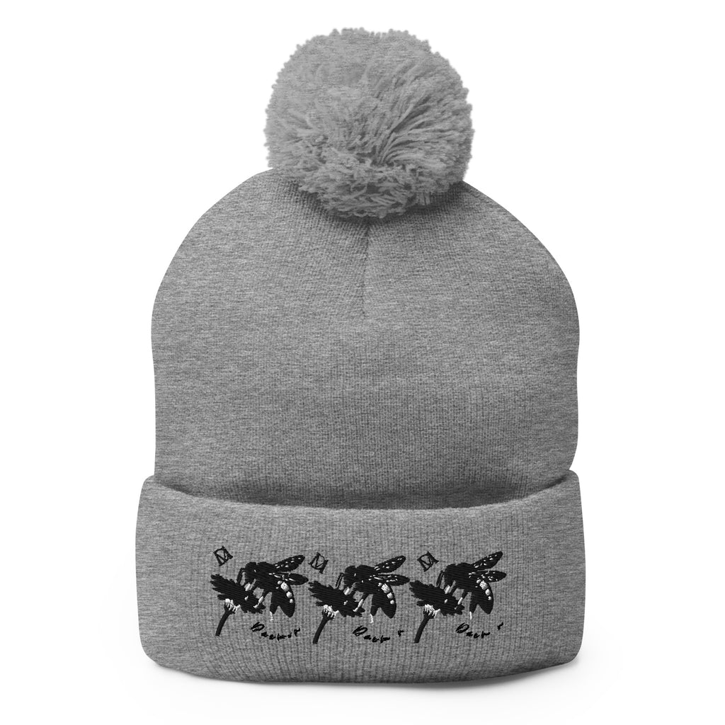 Daemon Luxury Stormless Berretto Lana pom-pom-knit cap in heather grey, front view showing cozy wool knit and pom-pom detail.