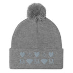 Daemon Luxury Stormless Portola berretto lana with pom-pom knit cap in heather grey, front view showing cozy wool design.