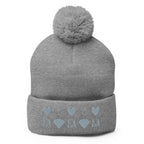 Daemon Luxury Stormless Portola berretto lana knit cap with pom-pom in heather grey, front view showing cozy, stylish winter hat.
