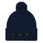 Daemon Luxury Sunless Buzz Central Blanco navy knit pom-pom cap with front detail, cozy lana style for winter warmth