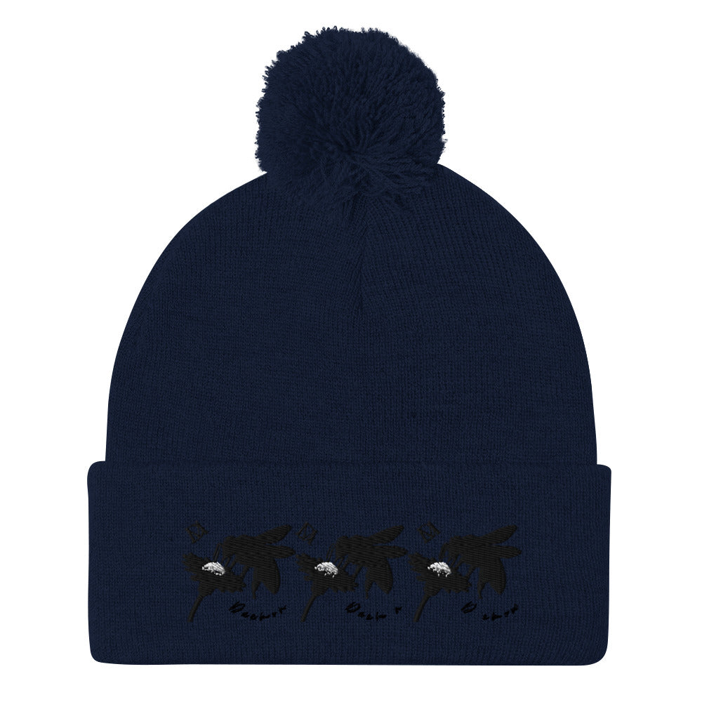 Daemon Luxury Sunless Buzz Central Blanco navy knit pom-pom cap with front detail, cozy lana style for winter warmth