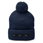 Daemon Luxury Sunless Buzz Central Blanco navy pom-pom knit cap with front view, cozy lana material.