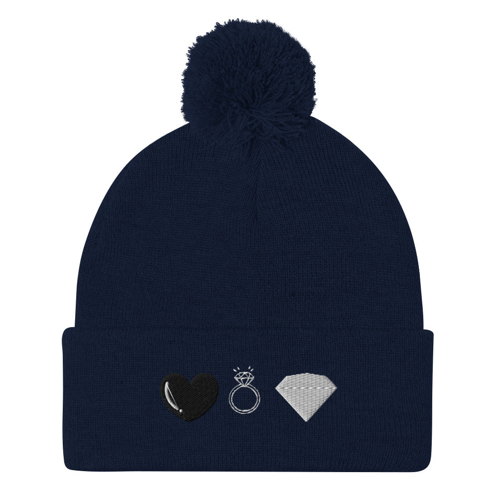 Daemon Luxury Elemental Powers Oceanic Nights navy knit pom-pom cap, cozy wool beanie with front design and soft texture.