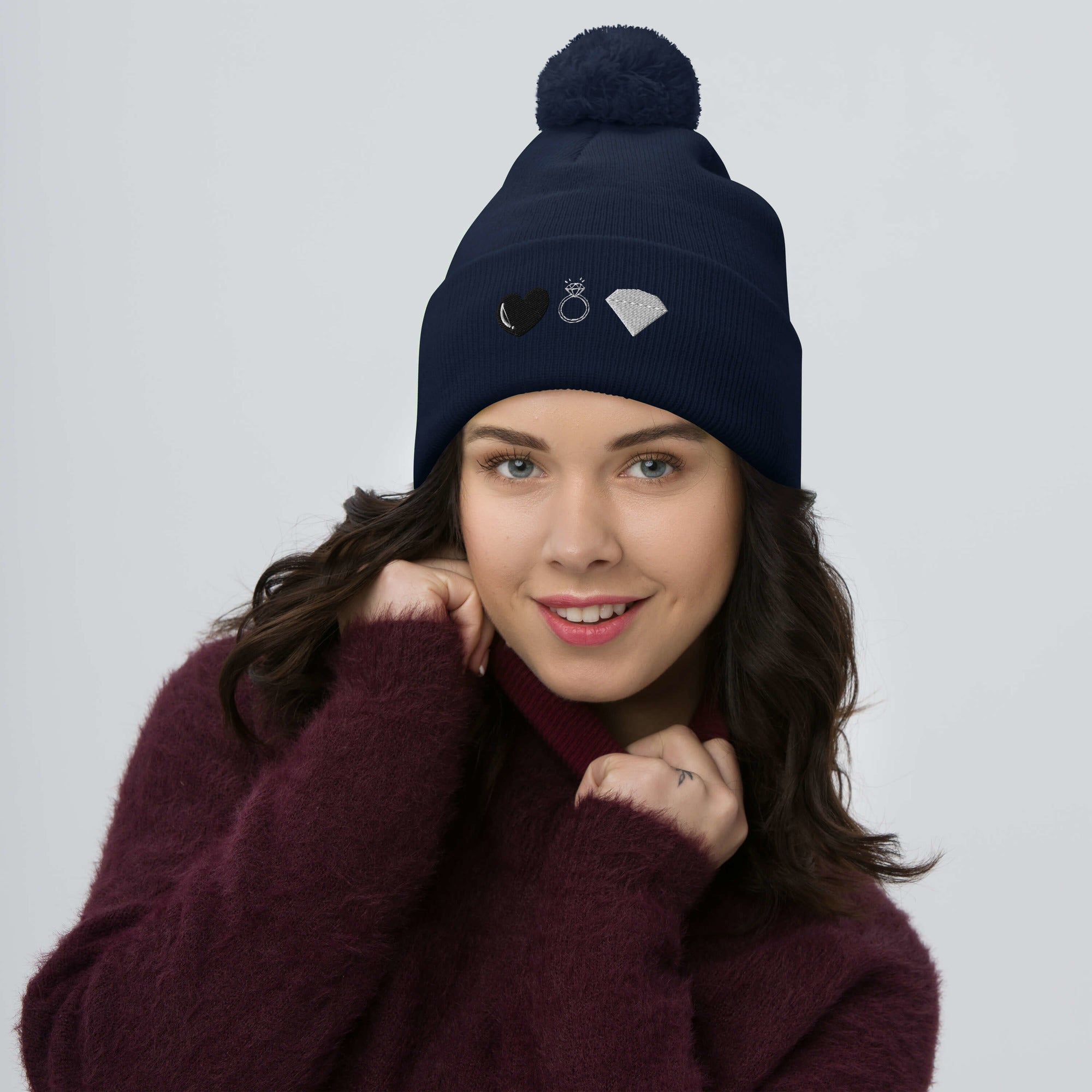 Daemon Luxury Elemental Powers Oceanic Nights navy knit pom-pom beanie cap with front design and cozy wool material.