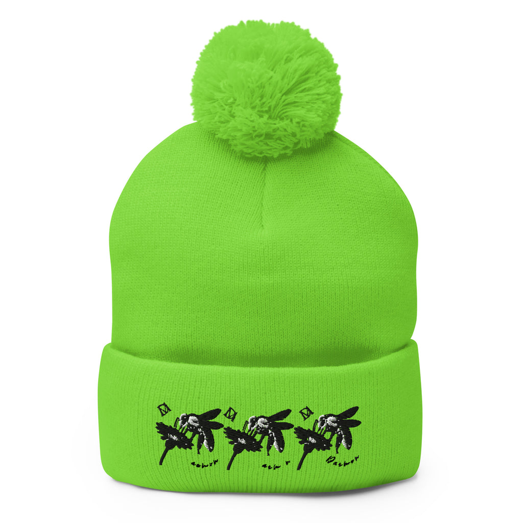 Neon green pom-pom knit cap from Daemon Luxury's Belly Red’s Garden Dim Sting collection, front view showing bright color and cozy texture.