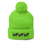Neon green pom-pom knit cap from Daemon Luxury's Belly Red’s Garden Dim Sting collection, front view showing bright color and cozy texture.