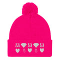 Frosted Diamonds stitched candies pom-pom knit cap in neon pink with front view, by Daemon Luxury.