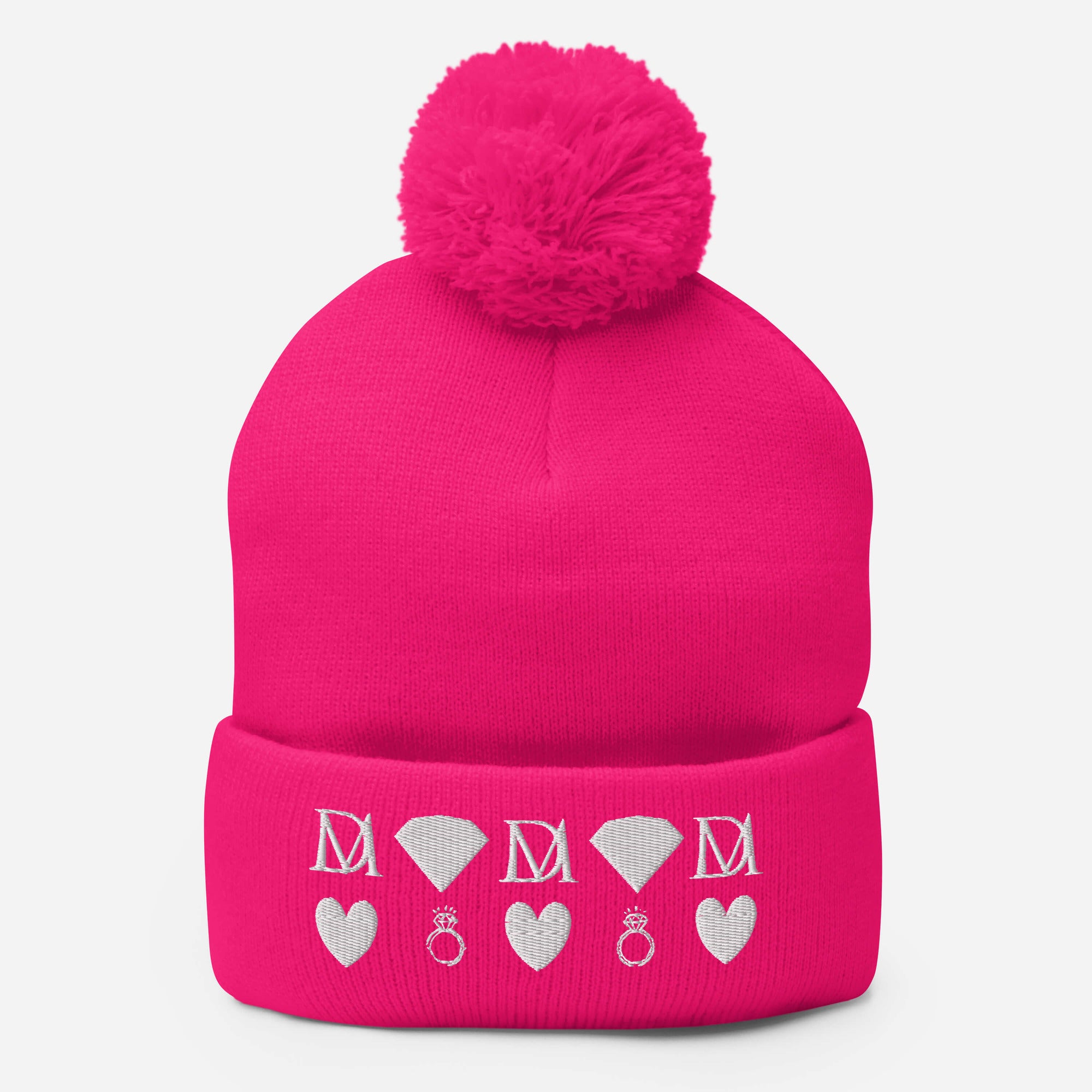 Pink knitted pom-pom cap with neon pink stitches and stitched candies design, from Daemon Luxury's Berretto Lana collection.