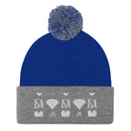 Daemon Luxury Storm Gen Frosted Diamonds wool pom-pom knit cap in royal heather grey, front view showing cozy winter style.