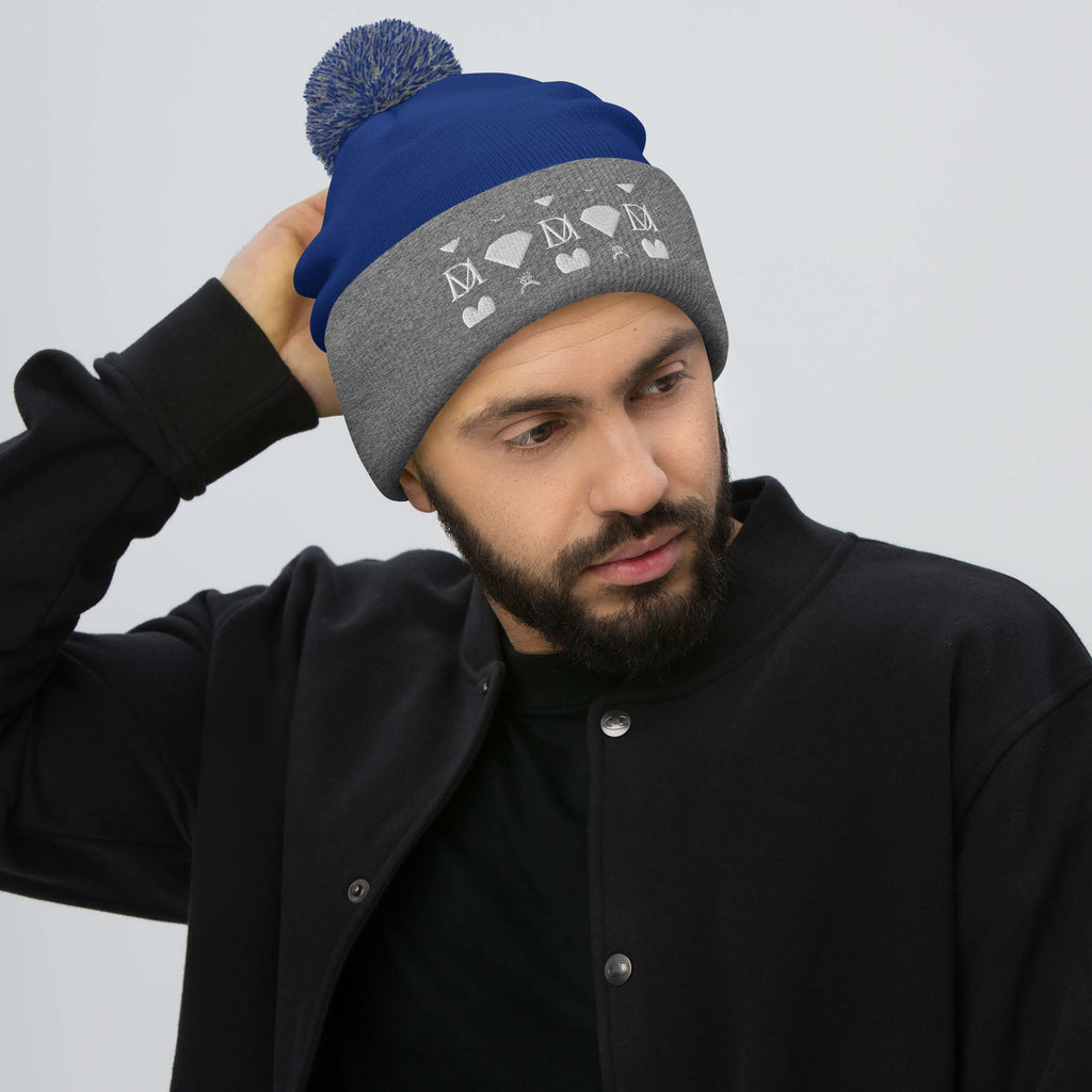 Daemon Luxury Storm Gen Frosted Diamonds wool pom-pom knit cap in royal heather grey, front view.
