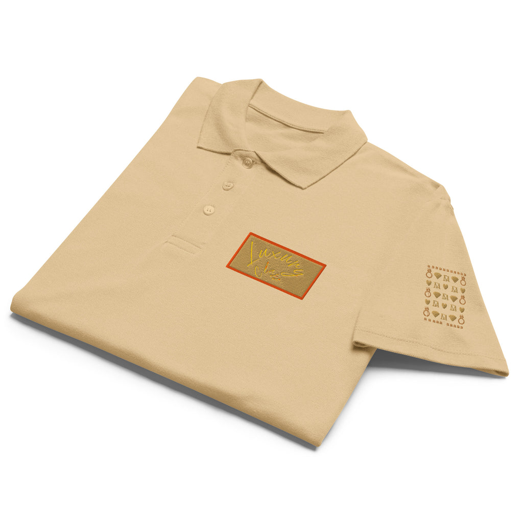 Unisex premium pique polo shirt by Daemon Luxury featuring Picasso Mirrors stitched labels in a stylish sand color, front view.