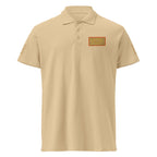 Unisex Premio il Man & Woman premium pique polo shirt by Daemon Luxury, sand color, front view with stitched label details.