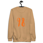 Daemon Honey Butter unisex khaki sweatshirt with a relaxed fit and soft fabric, featuring a subtle back design.
