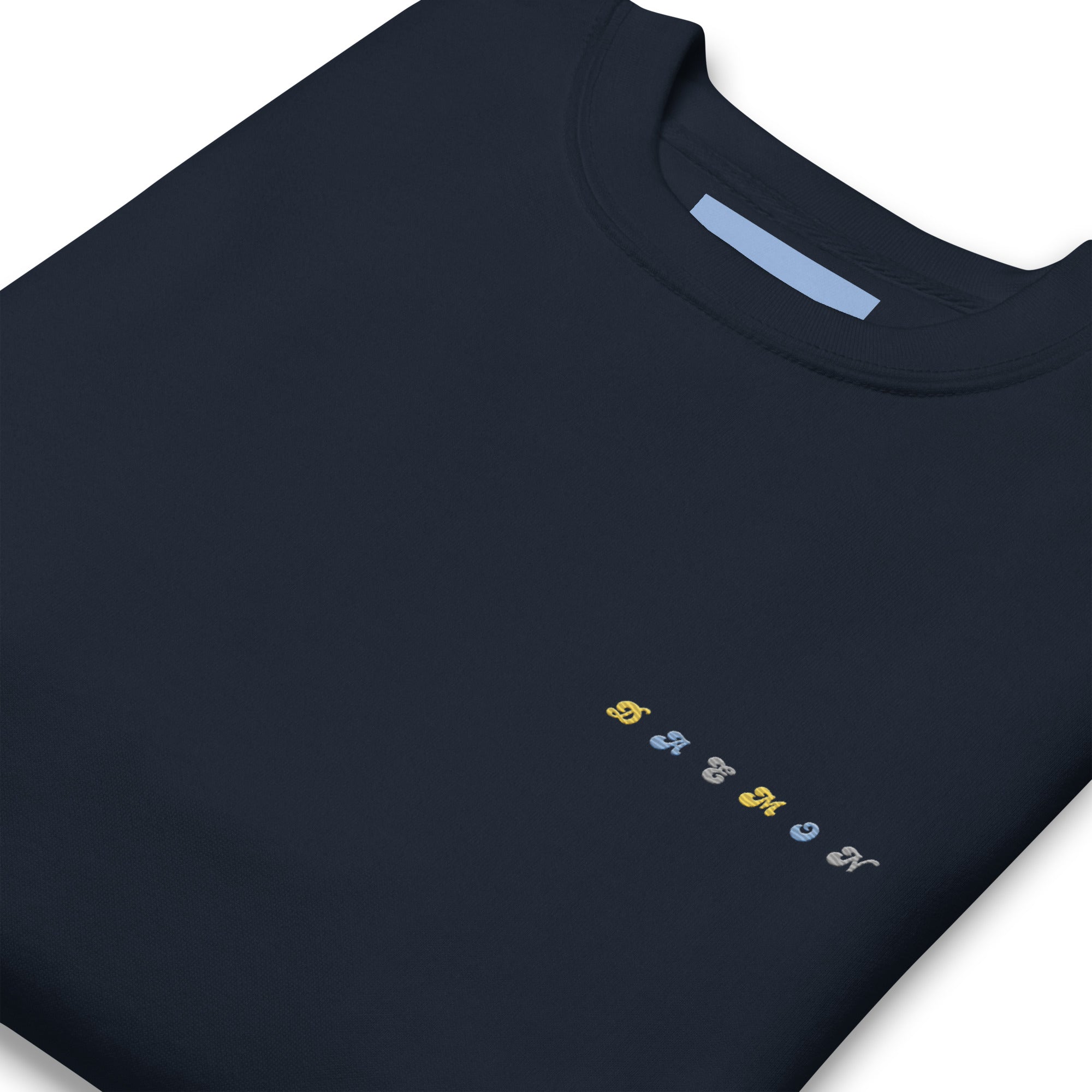 Navy blazer unisex premium sweatshirt from Daemon's Oceanic Nights collection, close-up of fabric texture and design details.