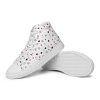 White high-top canvas shoes with speckled diamond design from Daemon Luxury's Artica Blizzard Female collection.