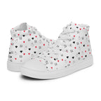 White high-top canvas shoes with speckled diamond accents from Daemon Luxury's Artica Blizzard Female collection.