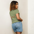 Women's high-waisted tee by Daemon Luxury from Honeybee Shores in artichoke color, featuring a stylish back design.