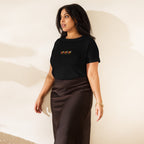 Daemon Luxury Honeybee Shores Premio il women's high-waisted black tee, front view showing fitted design and soft fabric.