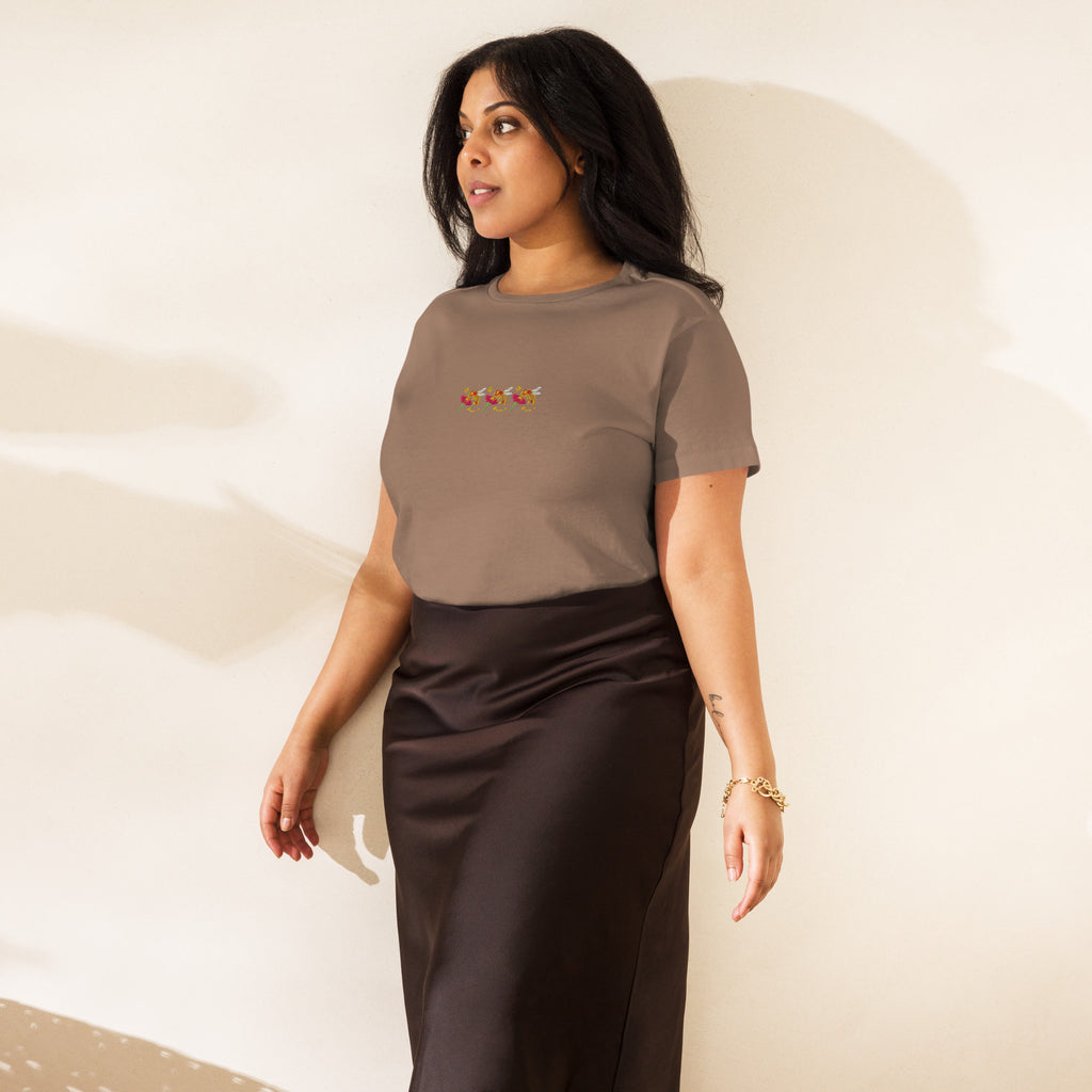 Woman wearing a high-waisted latte-colored tee from Honeybee Shores Premio il collection by Daemon Luxury, front view.