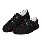 Black women's lace-up canvas shoes with speckled diamond pattern by Daemon Luxury, front view showing the design details.
