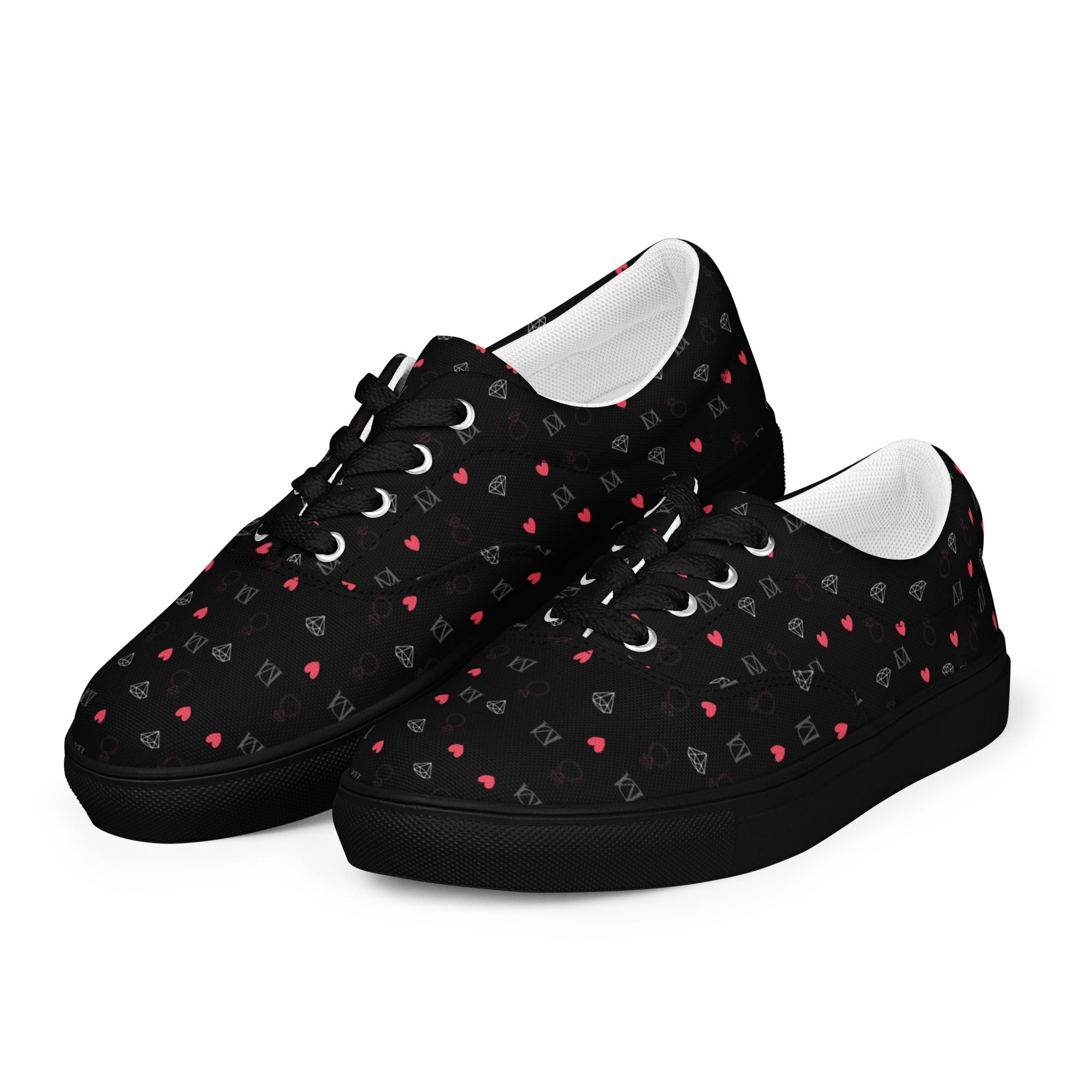 Black women's lace-up canvas shoes with speckled diamond pattern by Daemon Luxury, front view showing the design details.