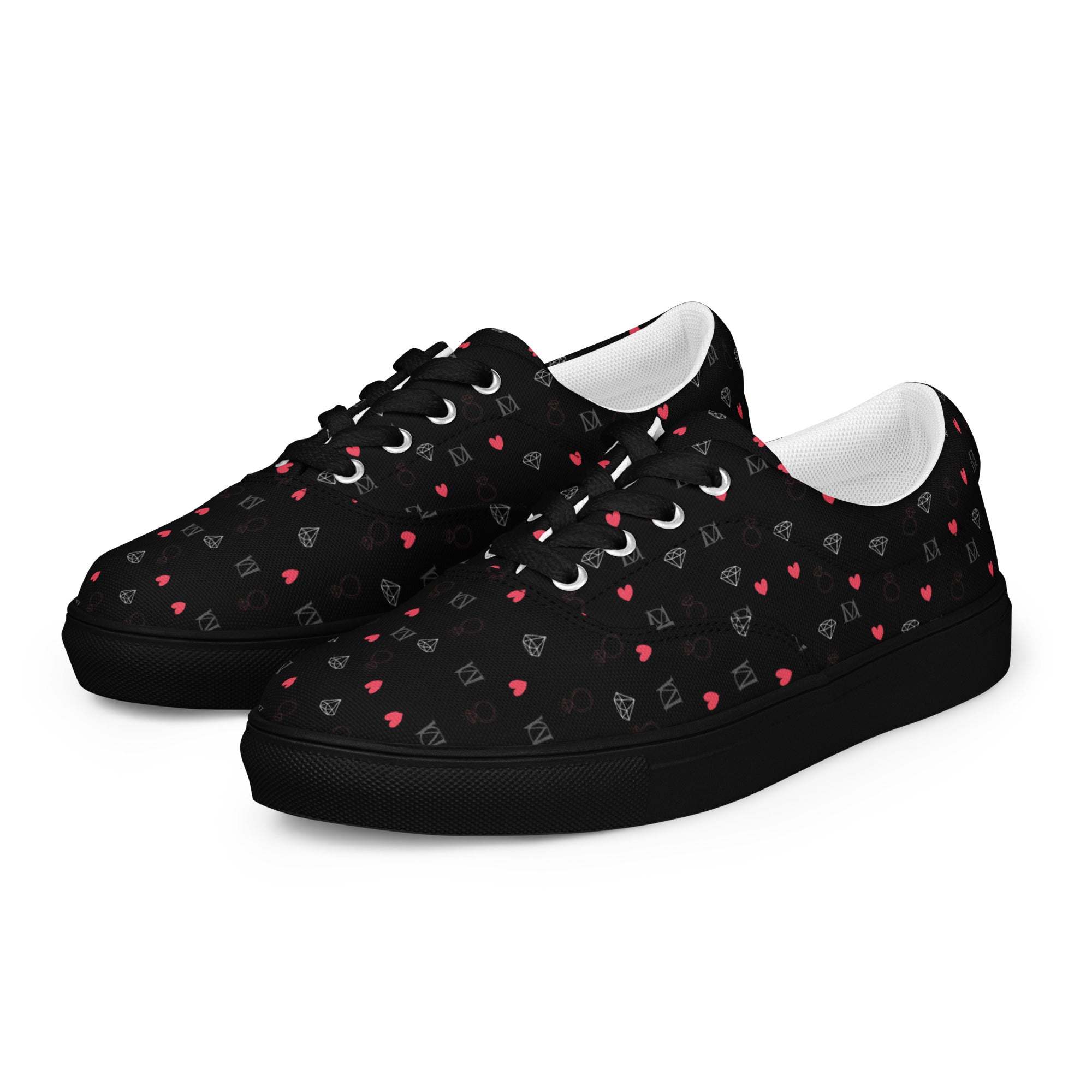 Black women's lace-up canvas shoes with speckled diamond design from Daemon Luxury, front view showing detailed pattern and stitching.