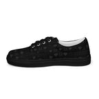 Black women's lace-up canvas shoes by Daemon Luxury with frosted diamond accents, showing the right inside view.