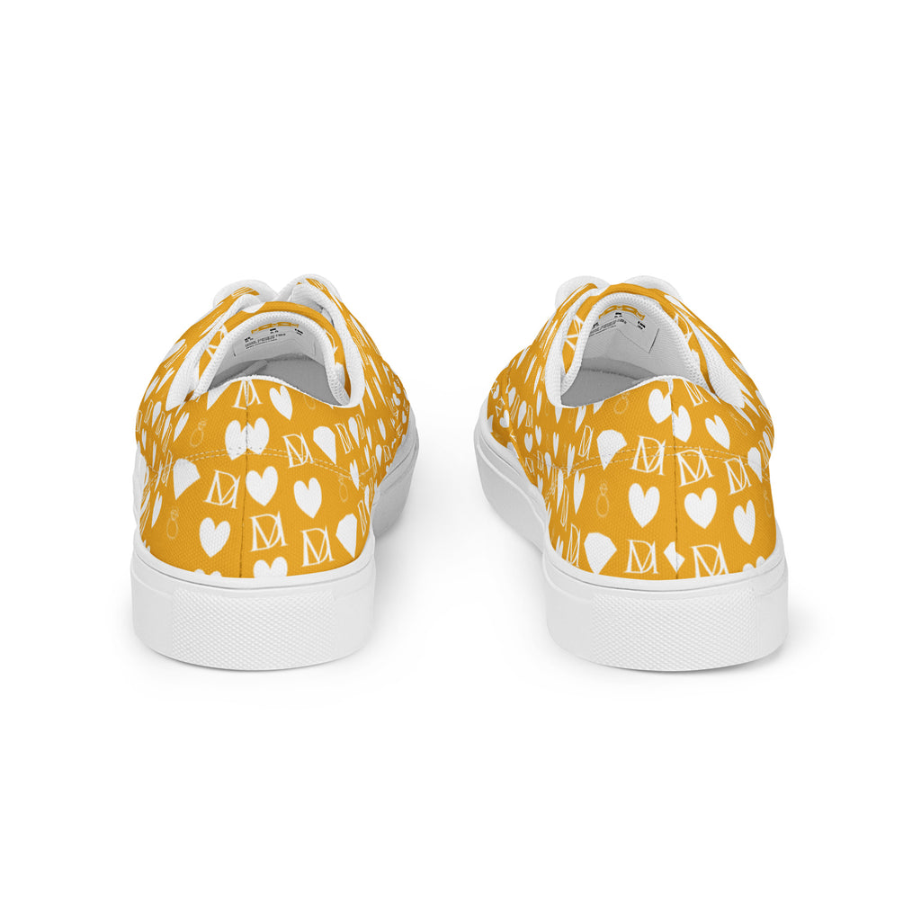 White lace-up canvas shoes for women with frosted diamond accents by Daemon Luxury, shown from the back view.